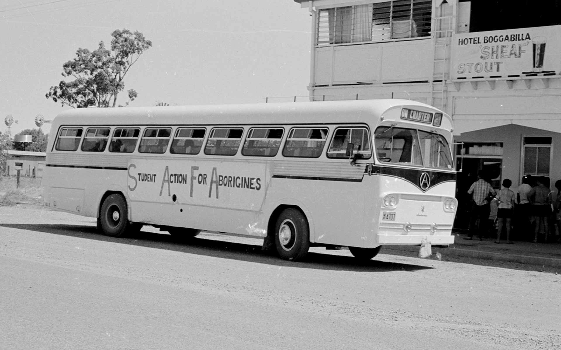 1965 Freedom Ride - The bus parked outside the Boggabilla Hotel where the students rested before talking to people on the station. Mitchell Library, State Library of New South Wales, Courtesy SEARCH Foundation.